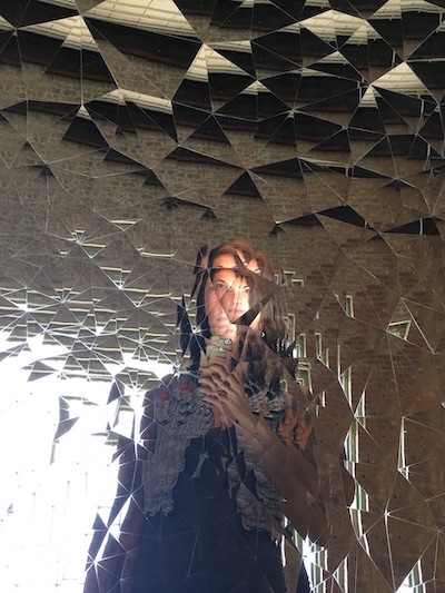 Jess taking a selfie of her reflection on Anish Kapoor's 'Untitled (2012)' reflective art peice at MassMoca.